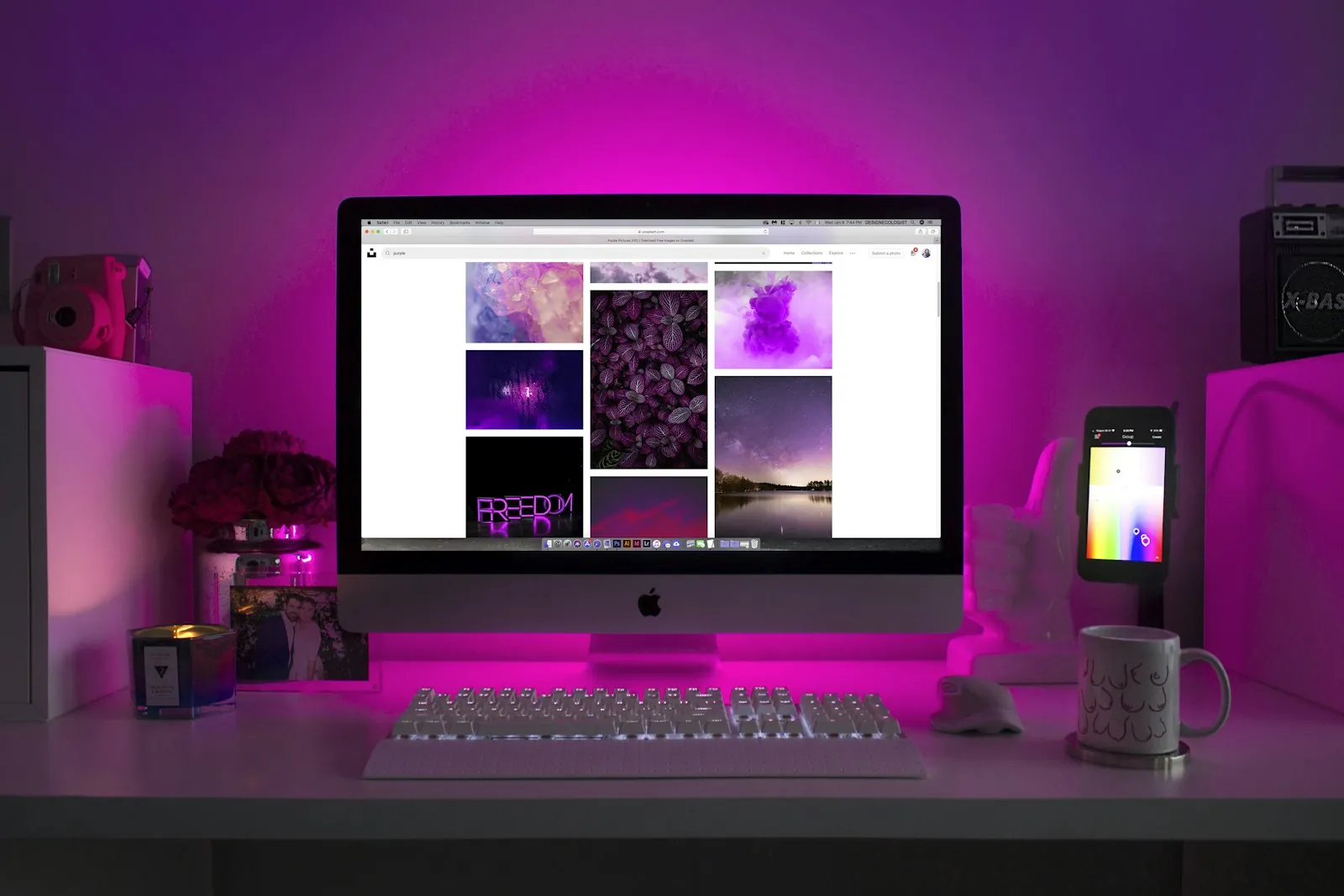 Dual-monitor design workstation beside a laptop running the same session